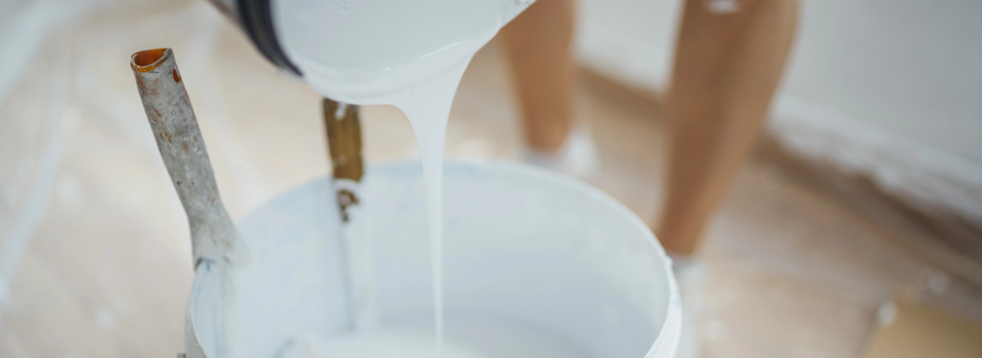 Liquid-applied building material